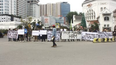 Aksi Peringatan Hari HAM Sedunia di Pelataran Parkir Pos Bloc Kota Medan